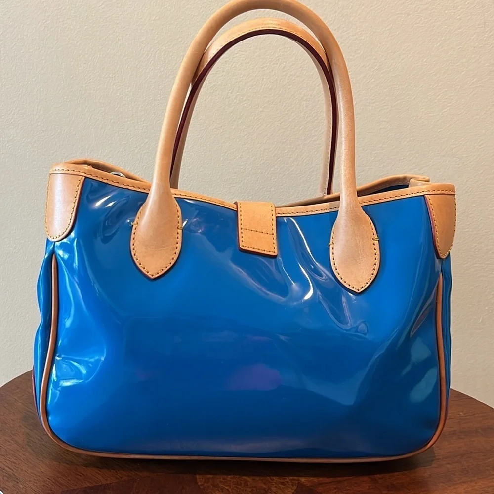 Dooney & Bourke  Satchel  Royal blue coated canvas/ tan leather trim   Like New